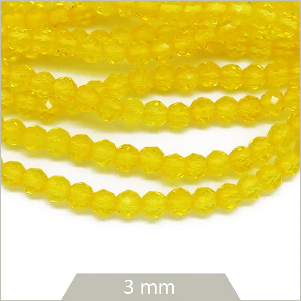 env. 145 perles de verre facettes jaune 3 mm