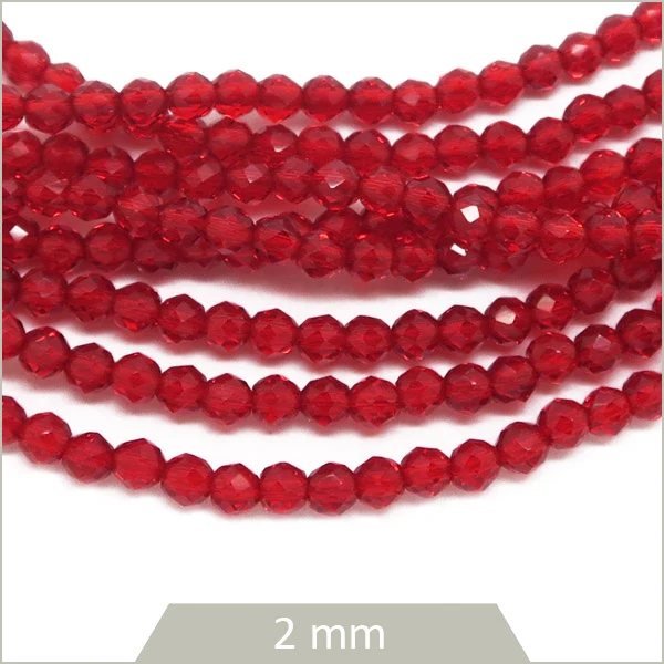 env. 180 perles de verre facettes rouge transparente 2 mm
