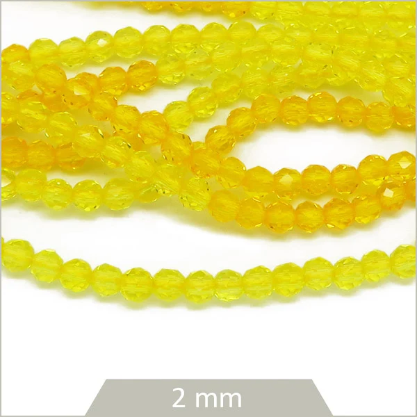 Env. 185 perles de verre à facettes 2 mm, bicolores jaune