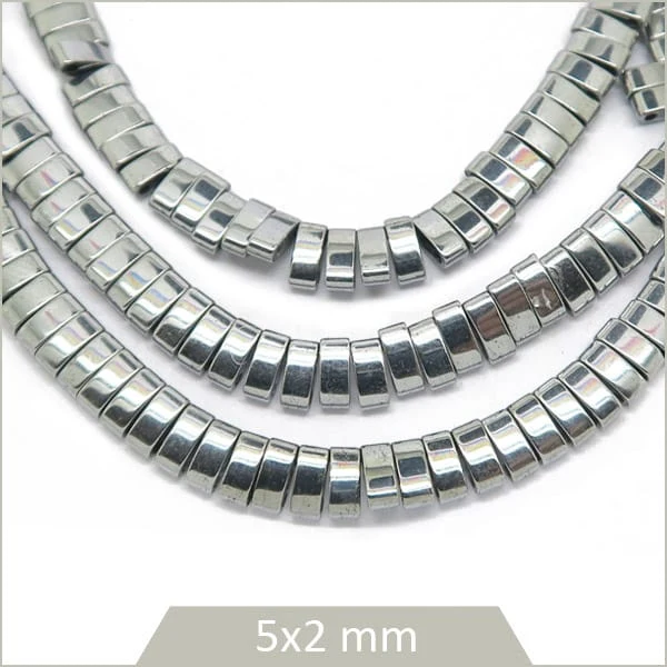 190 perles demi Tila en hématite argenté
