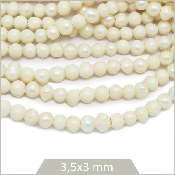 Env. 105 perles d'eau douce crème 3,5x3 mm